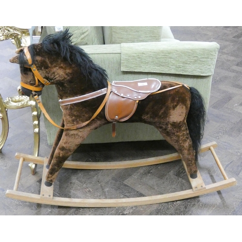 140 - A small brown plush rocking horse