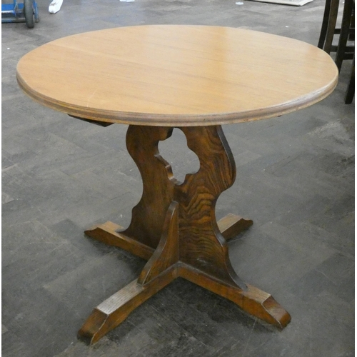 152 - A circular oak occasional or bar table on oak pillar base