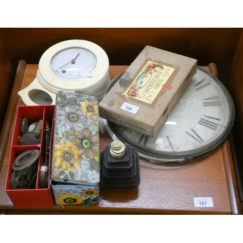 166 - Smith's white Bakelite wall clock, assorted clock keys, clock hands and other clock parts and a set ... 