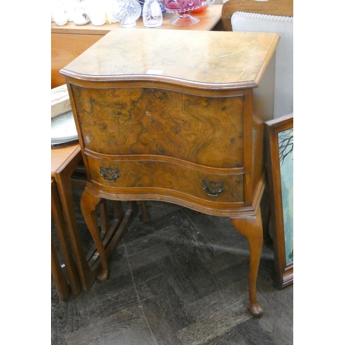 168 - A figured walnut serpentine front lift top workbox, fitted drawer on cabriole legs