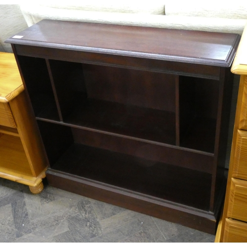 176 - A low mahogany open bookcase, 34