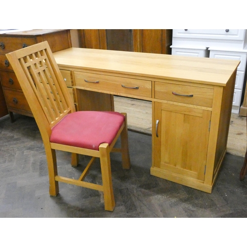 187 - A modern light oak finished kneehole desk fitted five drawers and cupboard and similar matching chai... 