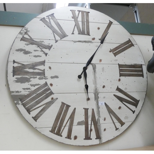 19 - A large circular painted wooden battery wall clock, 3' diameter