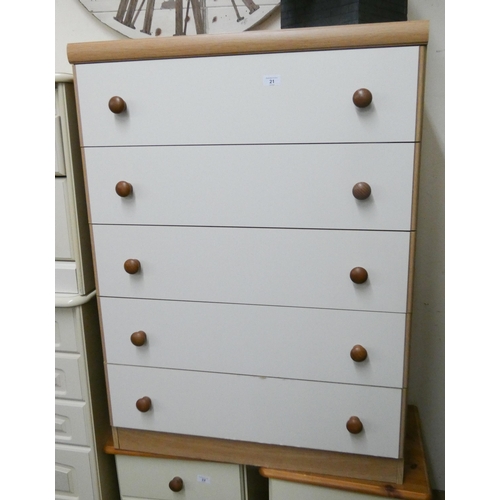 21 - A modern light oak and white chest of five long drawers, 31