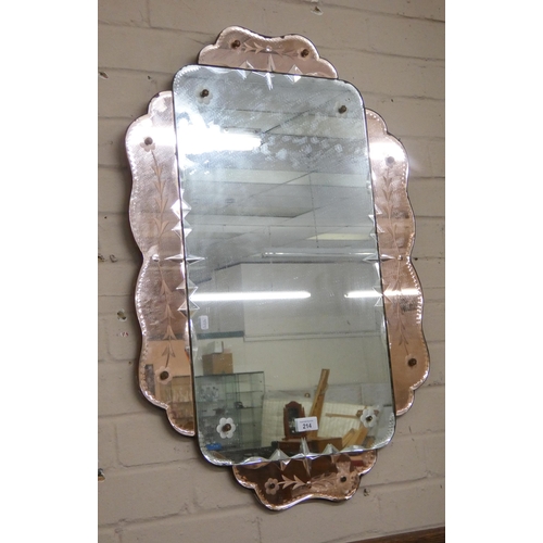 214 - A frameless Venetian style wall mirror with pink glass panels