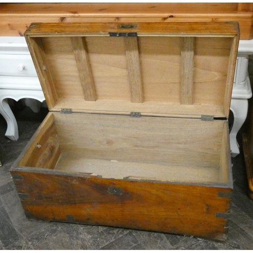 219 - A teak brass bound uniform trunk, 2'9 wide