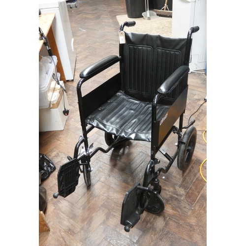 290 - A black fold-up push along wheelchair