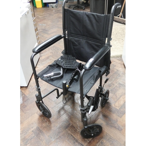 292 - A fold-up push along wheelchair