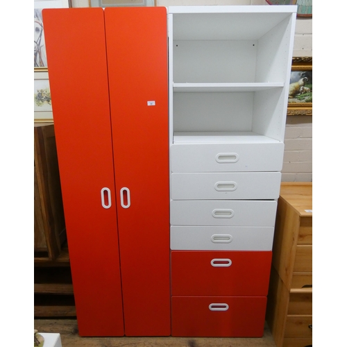 32 - A red and white two section bedroom cabinet fitting hanging space, drawers etc, 4' wide