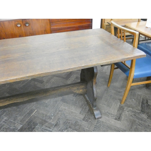 52 - A large oak refectory style dining table with good solid thick top, 82