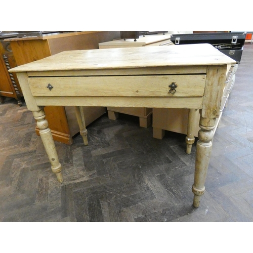 60 - A Victorian stripped and waxed pine side table fitted one long drawer on turned legs, 3' wide