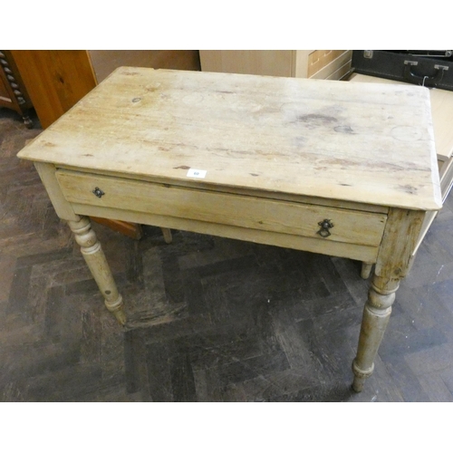 60 - A Victorian stripped and waxed pine side table fitted one long drawer on turned legs, 3' wide