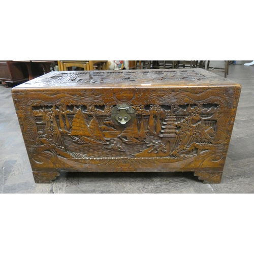 80 - A carved camphor wood blanket chest, 37