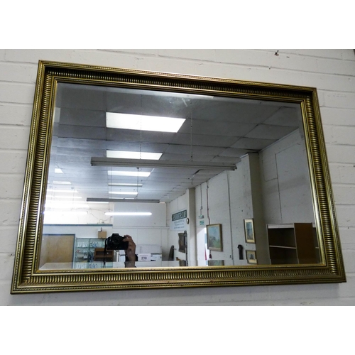 238 - A large bevelled wall mirror in Victorian style gilt framed