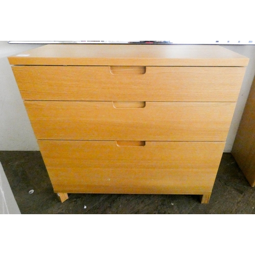 244 - A modern light oak chest of three long drawers, 2'6 wide