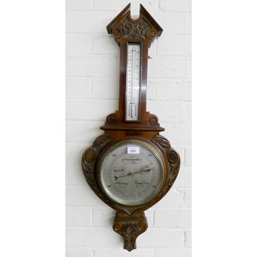 249 - An Edwardian banjo wall barometer in carved walnut case