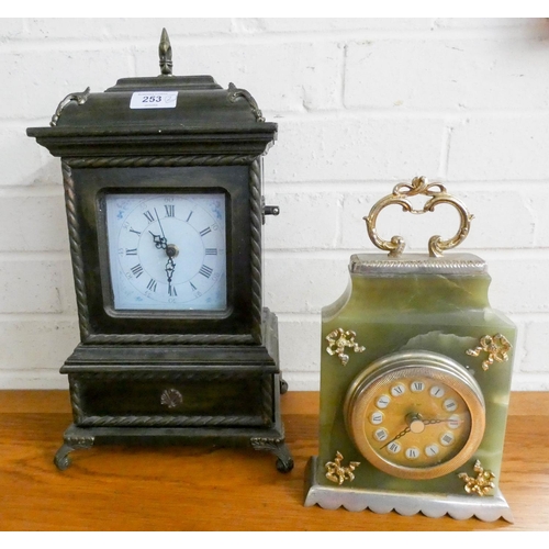 253 - An electric bracket clock and a small onyx clock