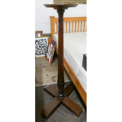 259 - A Victorian mahogany torchiere on platform base