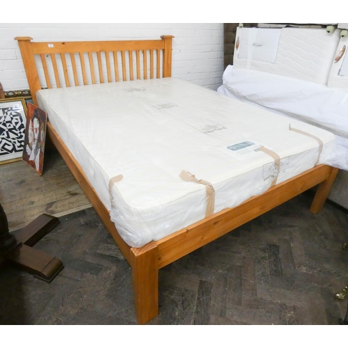 83 - A 4'6 modern pine slatted bedstead with Dreamworld spring interior mattress