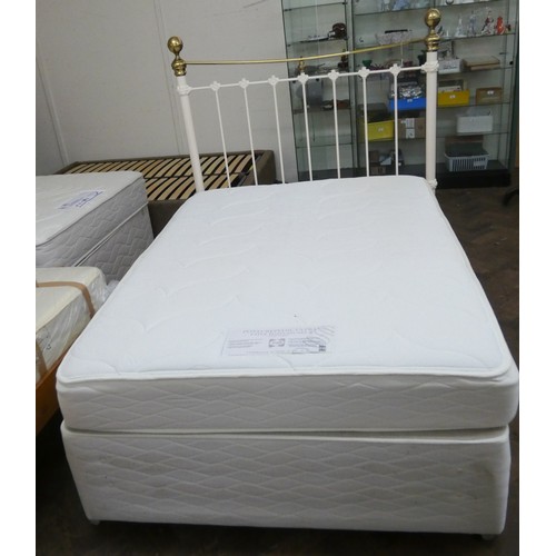 84 - A 4'6 drawer divan with spring interior mattress and Victorian style cream and brass rail headboard ... 