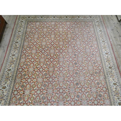 103 - A red and patterned Wilton carpet, 11'6 x 8'3