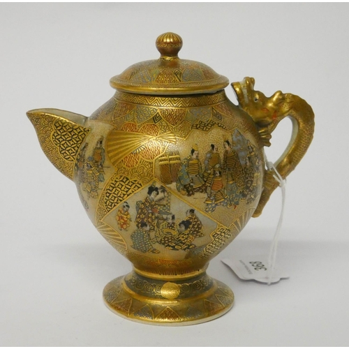 185 - Japanese Satsuma teapot with dragon handle and seal marks to base, 13cms tall