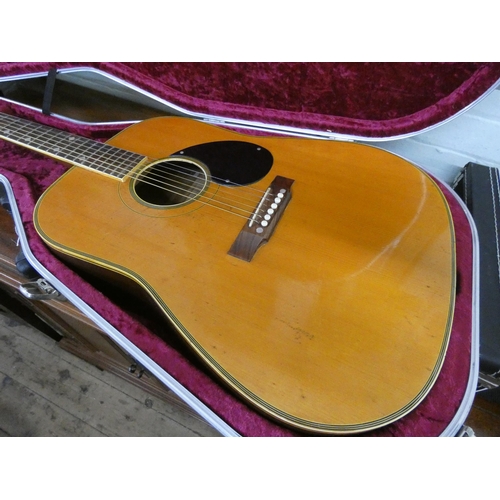 115 - An Angelica six string acoustic guitar in hard carrying case