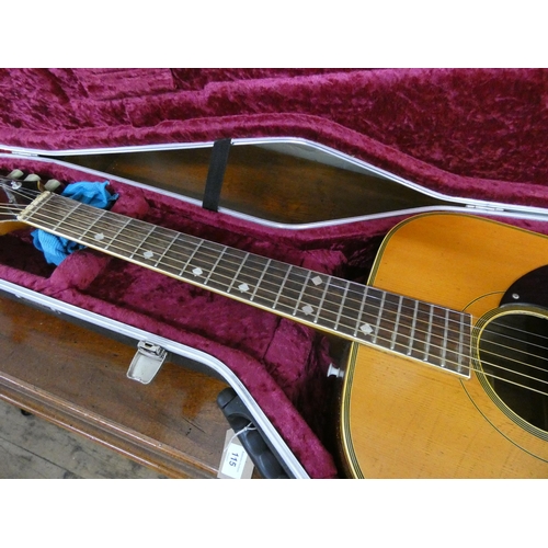 115 - An Angelica six string acoustic guitar in hard carrying case