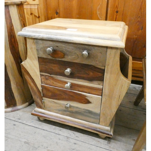 27 - A small hardwood chest fitted four drawers with magazine rack sides