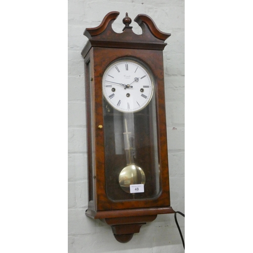 48 - A Comitti London striking and chiming wall clock in walnut and glazed case