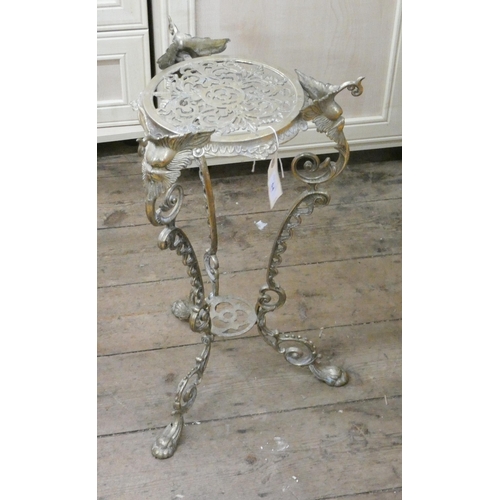 54 - A decorative brass plant stand