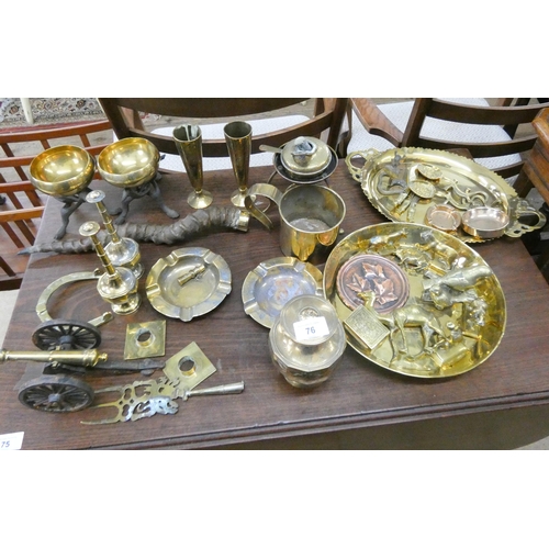 76 - A collection of assorted brass ornamental items