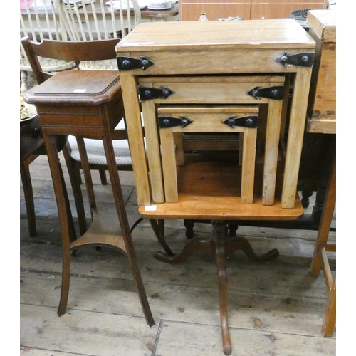 77 - A nest of three pine coffee tables, small mahogany occasional table and two tier plant pedestal