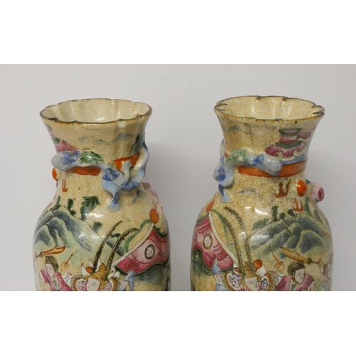 182 - A pair of Japanese crackleware frilled rim Satsuma style vases, 26cms tall, impressed seal mark to t... 