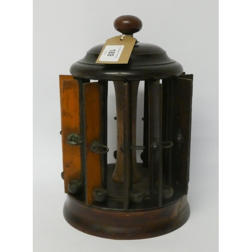 189 - An Edwardian turned Treen table top cigar dispenser