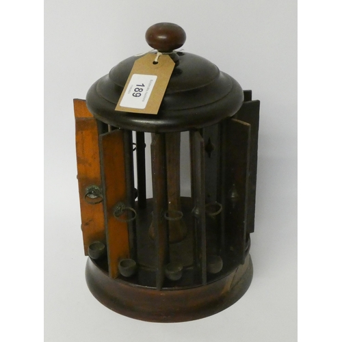 189 - An Edwardian turned Treen table top cigar dispenser