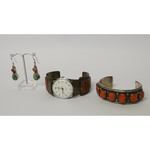 562 - Chunky red coral set bangle, Sekonda cuff style watch, and a pair of drop earrings