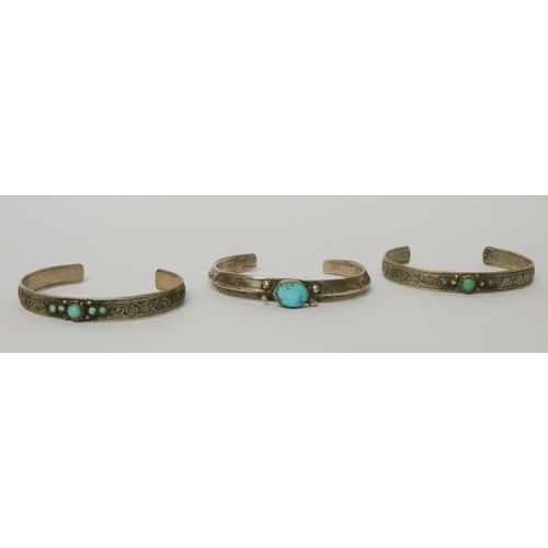 568 - Three white metal and turquoise set bangles