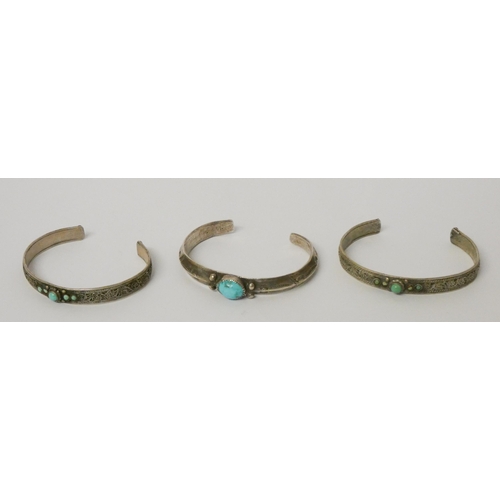 568 - Three white metal and turquoise set bangles