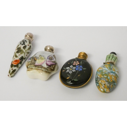 515 - A collection of four Victorian and later scent flasks to include: two porcelain examples and an enam... 