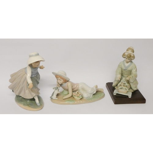 196 - Three Lladro style figurines of girls