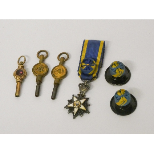 197 - A Middle Eastern miniature medal on blue and gold ribbon together with three watch keys etc