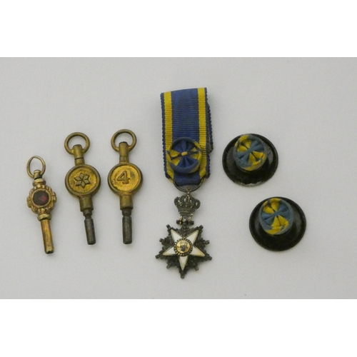 197 - A Middle Eastern miniature medal on blue and gold ribbon together with three watch keys etc