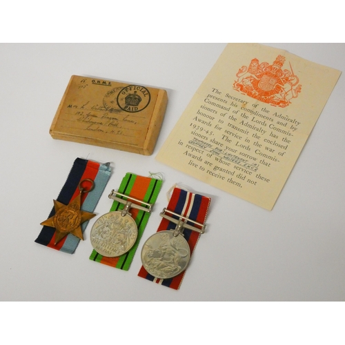 198 - Three medals of the Second World War in original box with ribbons and condolence slip, named Tempora... 