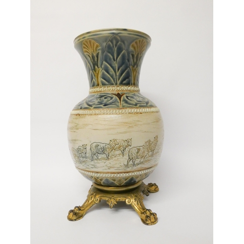 199 - Hannah Barlow Doulton stoneware vase, decorated with sgraffito sheep grazing, on gilt metal base. He... 