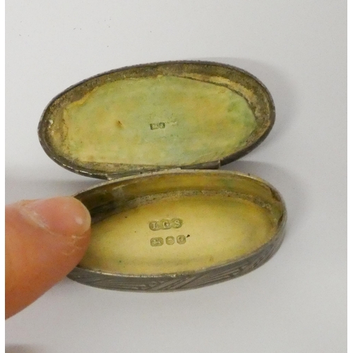 532 - Miniature oval silver pill box, hallmarked.