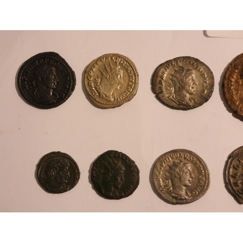 558 - A collection of 21 Roman coins in base silver and bronze, various emperor's from Antonius Pius to Co... 