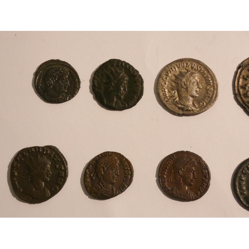 558 - A collection of 21 Roman coins in base silver and bronze, various emperor's from Antonius Pius to Co... 