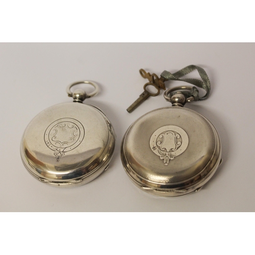 547 - Two silver pocket watches, one by Waltham with key