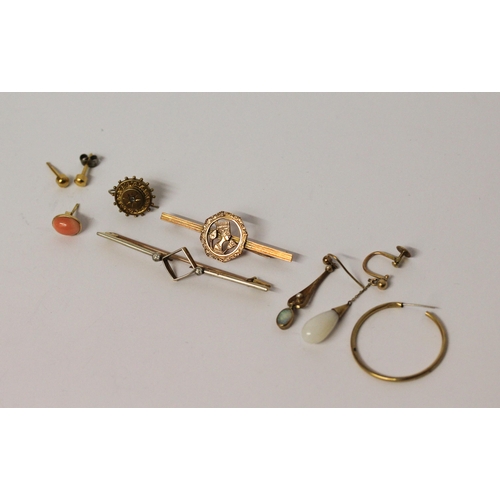 584 - Nefertiti Eastern gold bar brooch and a collection of odd jewellery to include odd earrings and an E... 